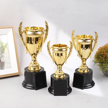 1gb Mini Plastmasas Apbalvojumu Trophy Bērniem Uzvarētājs Zelta Trofejas Rotaļlietas Bērniem Atlīdzība Karnevāls Konkurences Balvu Puses dod priekšroku